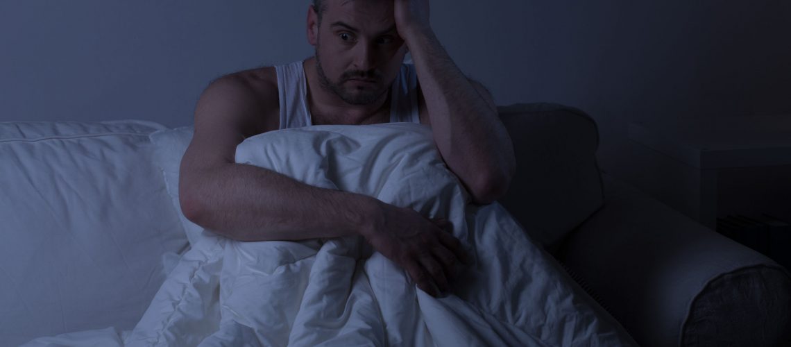 39459879 - mature man with insomnia sitting in the bed